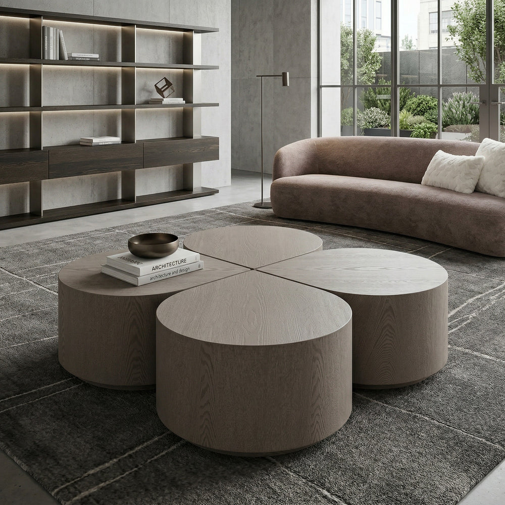 Tear Drop Coffee Table Ash made of oak wood with a smooth, curved design, displayed in a modern living room setting.