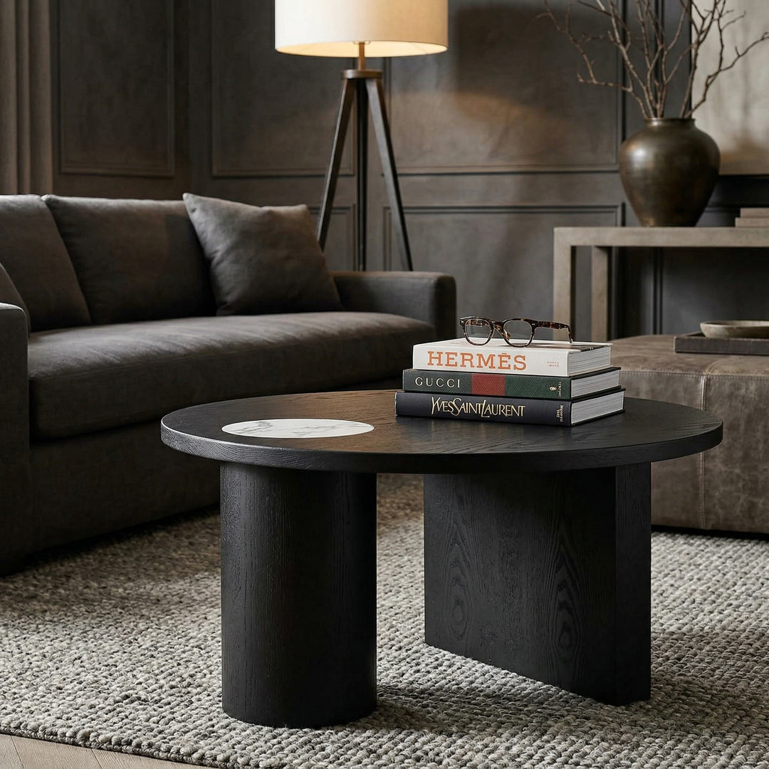 Small Palma coffee table with a round wooden top and sleek metal legs, placed in a modern living room setting.