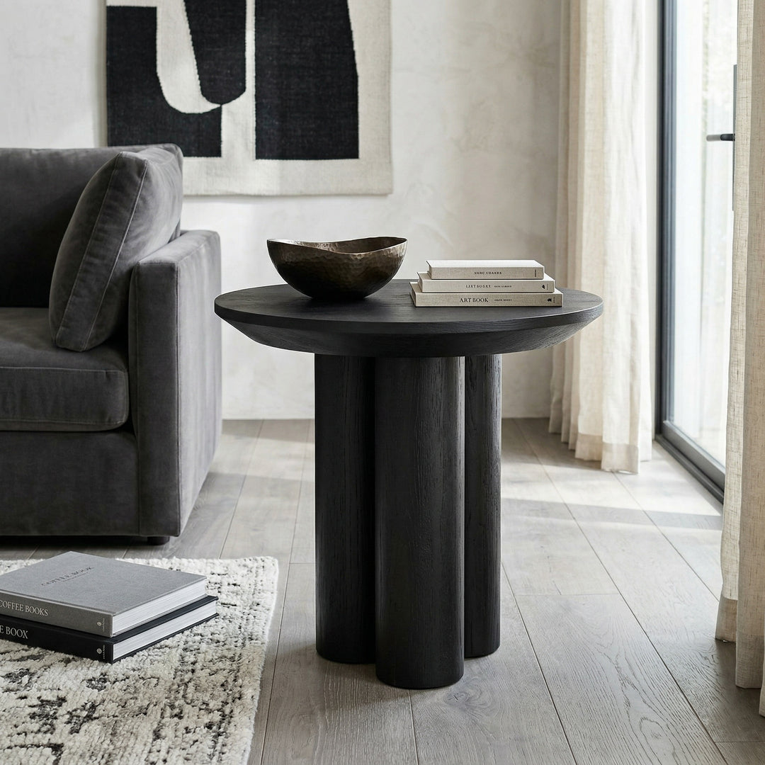 Black oak wood side table with a modern design, featuring a sleek black finish and a compact, stylish profile.