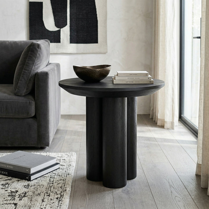 Black oak wood side table with a modern design, featuring a sleek black finish and a compact, stylish profile.