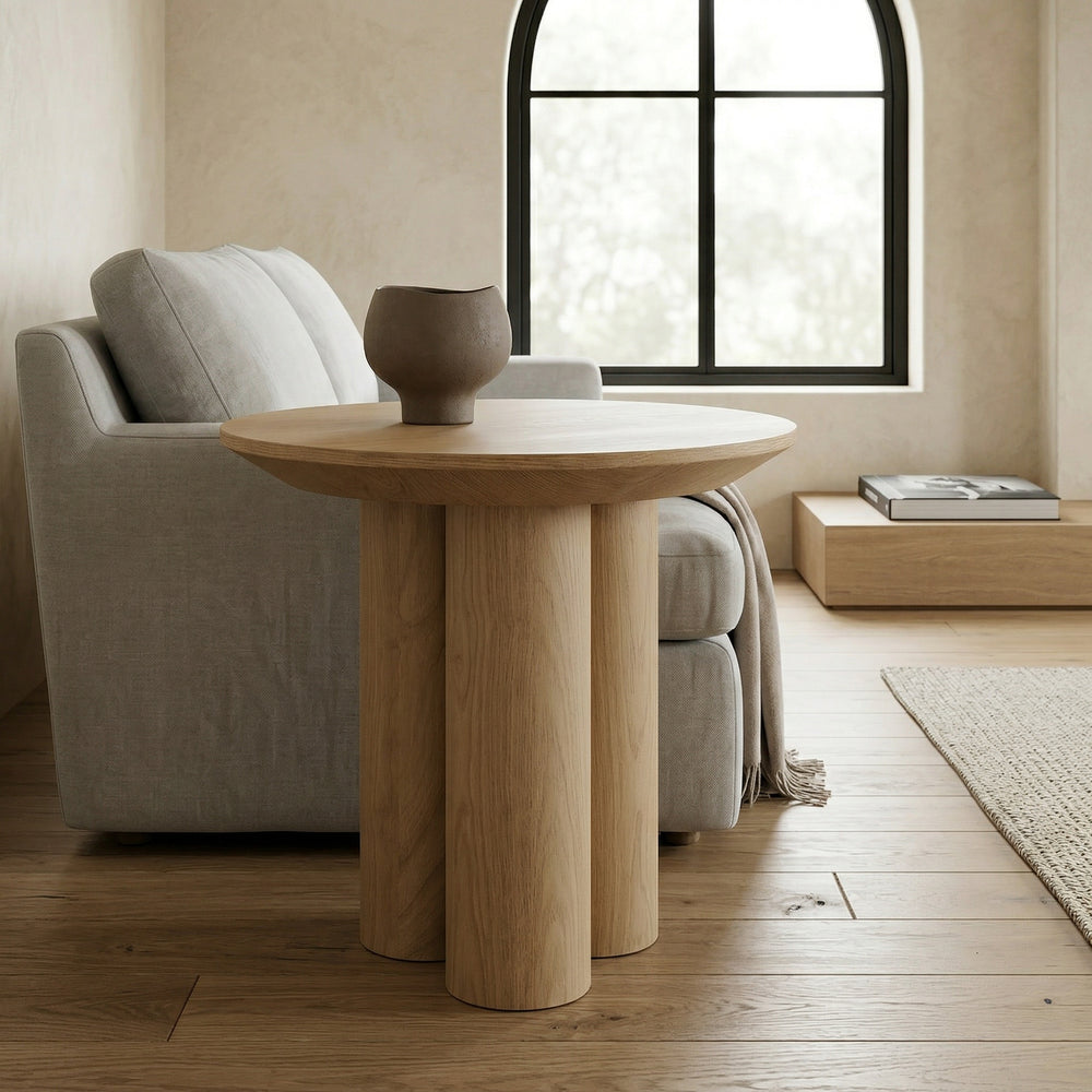 Light oak trio side table with modern design, featuring three interconnected tables in a living room setting.