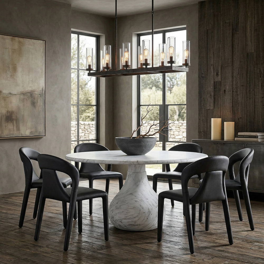 Aqua round dining table with marble finish, 1.5 meters diameter, shown alongside matching dining chairs in a modern setting.