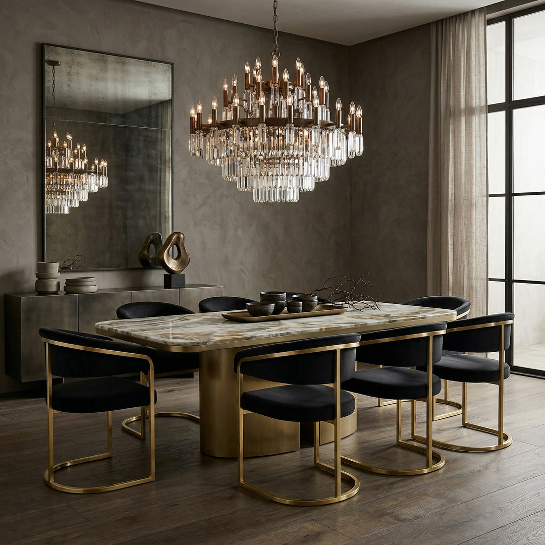 Black velvet Gianna dining chair with sleek, modern design, featuring a comfortable cushioned seat and stylish tapered legs.