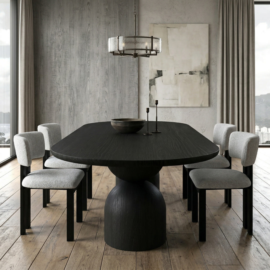 Black Tulip Oval Dining Table 2.8m with matching dining chairs in a modern dining room setting.
