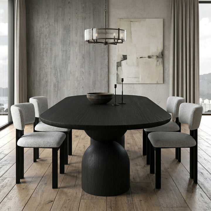 Black Tulip Oval Dining Table 2.8m with matching dining chairs in a modern dining room setting.