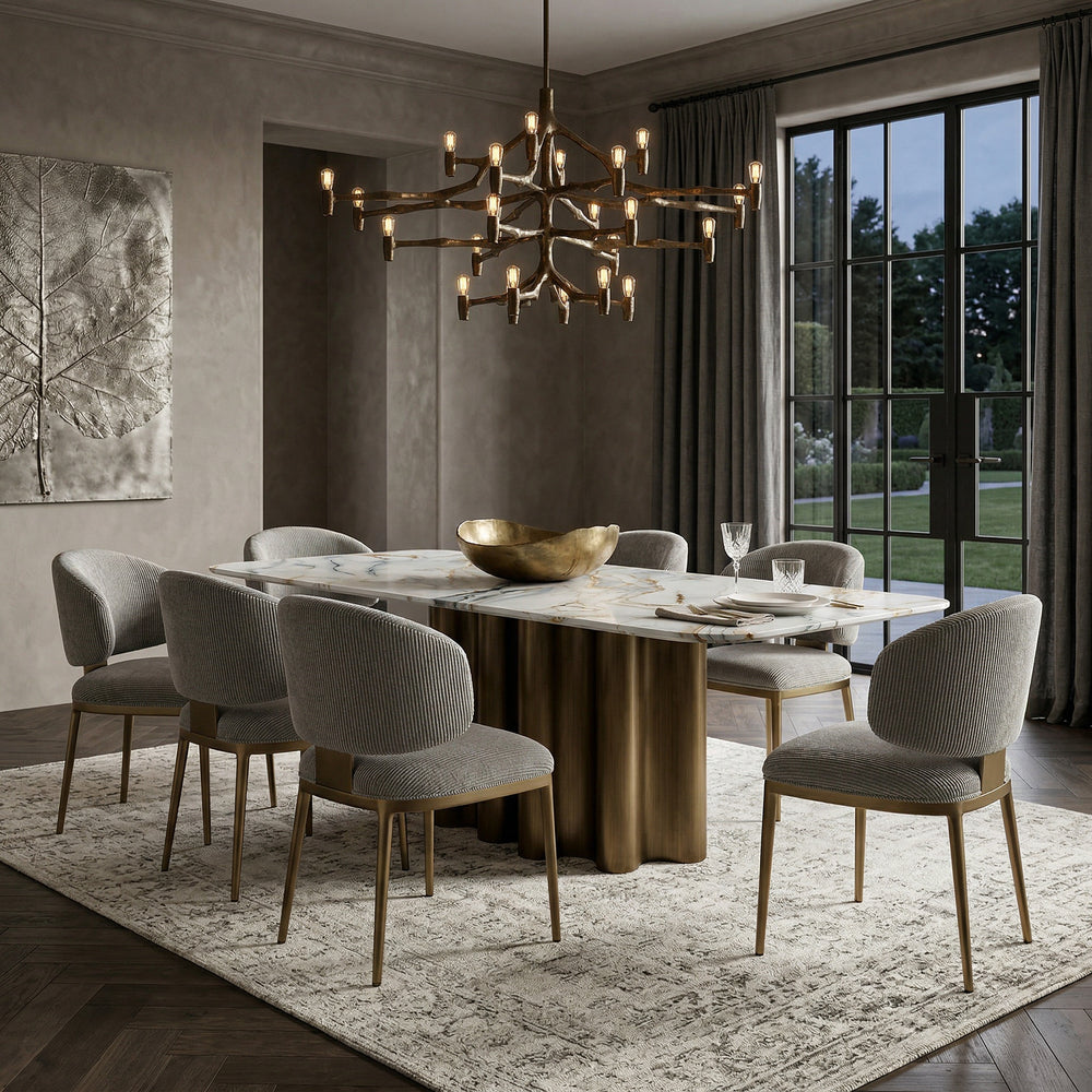 Elegant Regalia dining chair with plush upholstery and wooden legs, paired with a matching dining table in a luxurious setting.
