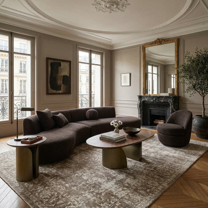 Nano banana-shaped Bellissama coffee table paired with matching side table, chocolate-colored finish, modern living room decor.