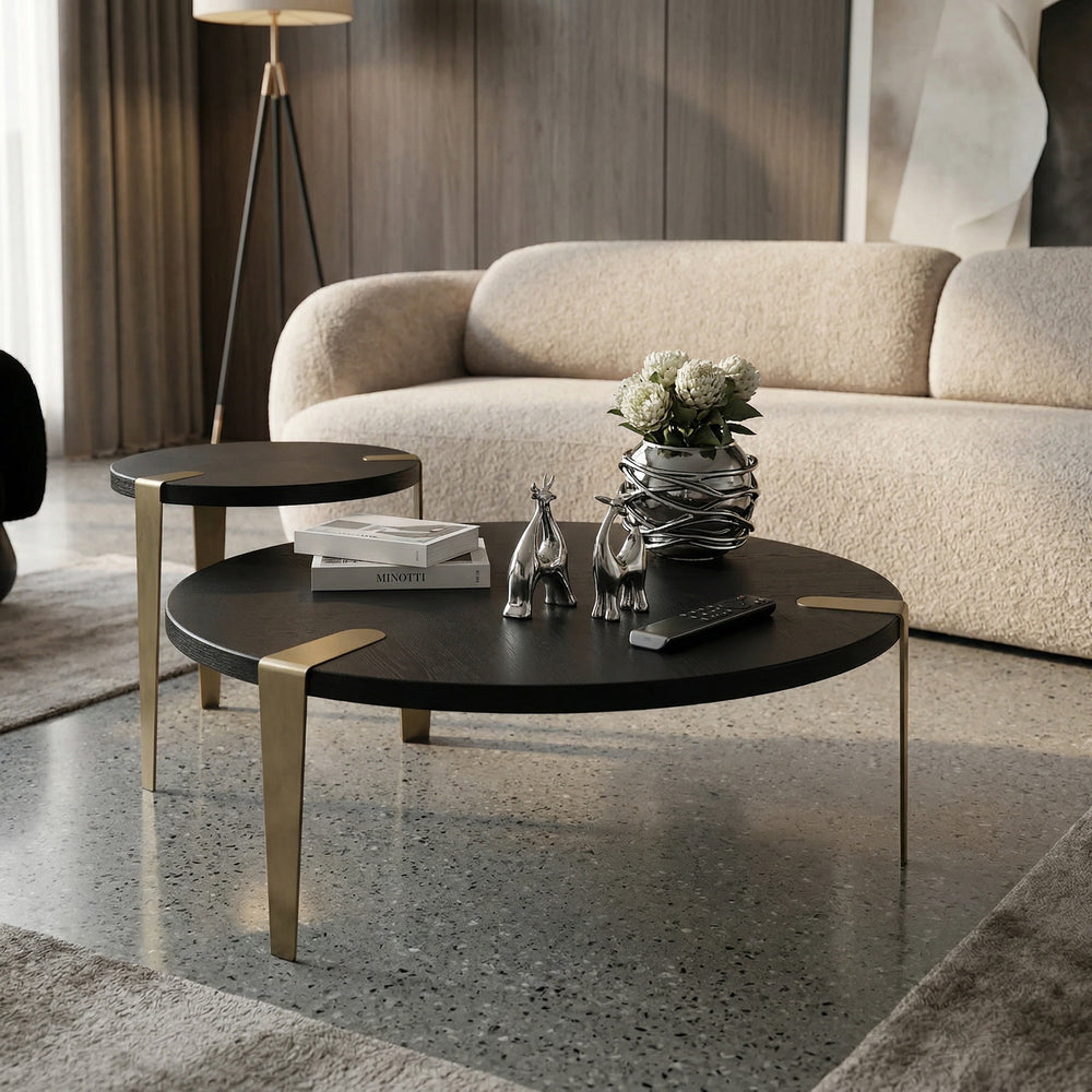 Small Levante coffee table in a living room setting with sofa, showcasing a modern design and wooden finish.