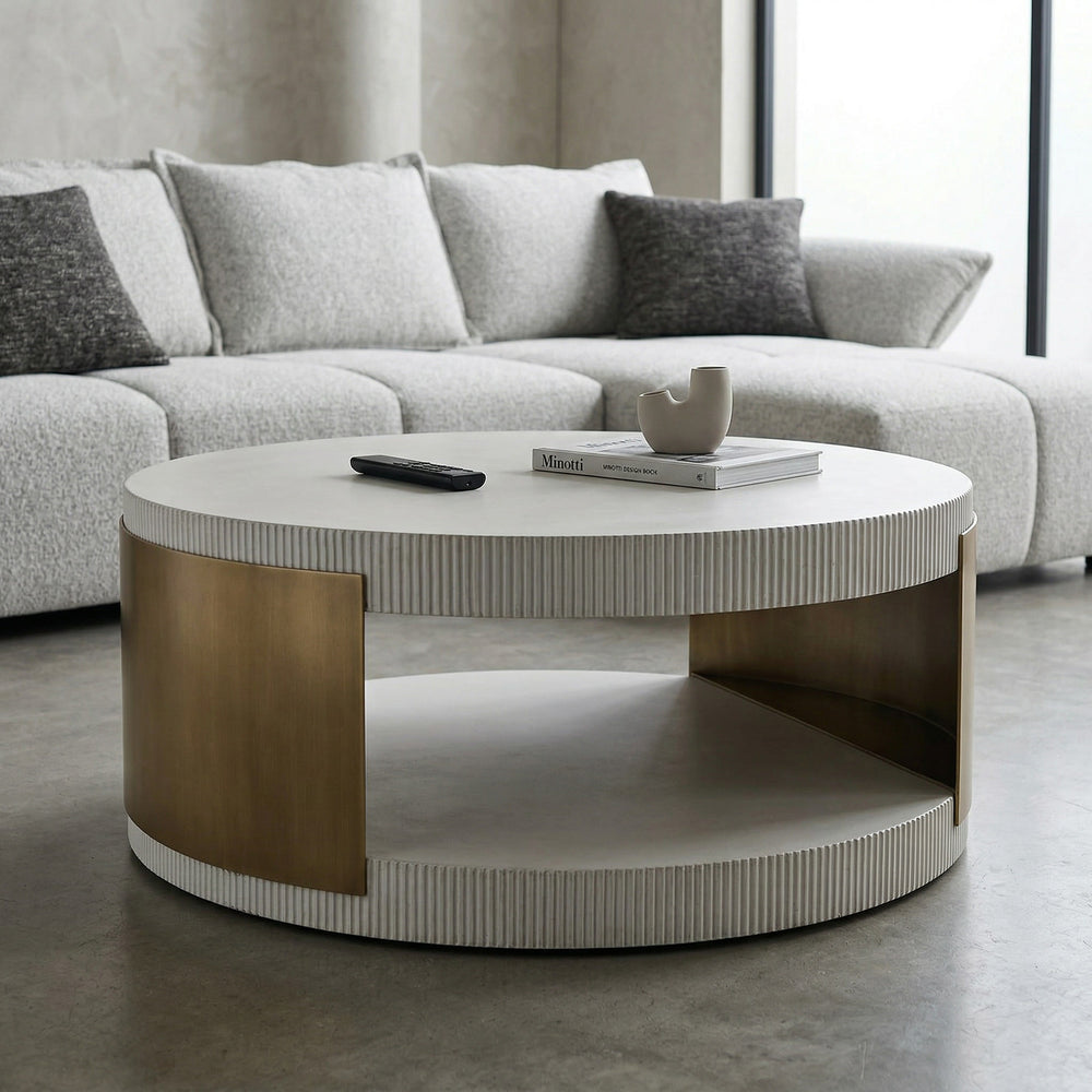 Luxurio coffee table in a modern living room setting with a sofa, showcasing its sleek design and natural wood finish.