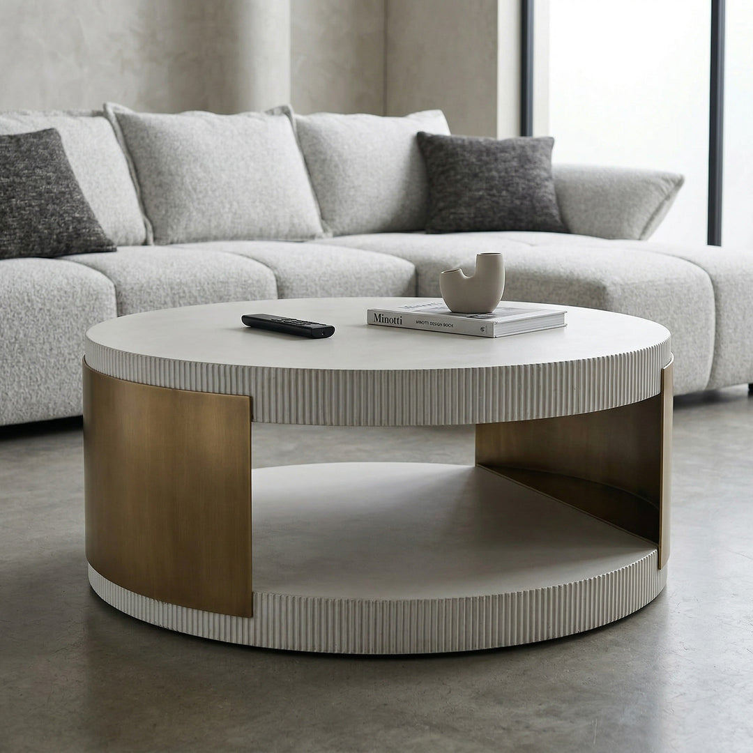 Modern Luxurio coffee table in a living room setting, paired with a sofa, showcasing its sleek design and natural wood finish.