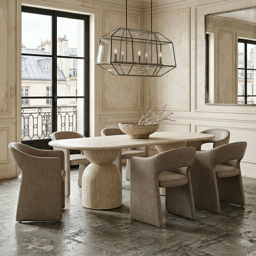 Emilia dining chair with mushroom-colored faux leather seat and modern design, shown next to a rectangular dining table.