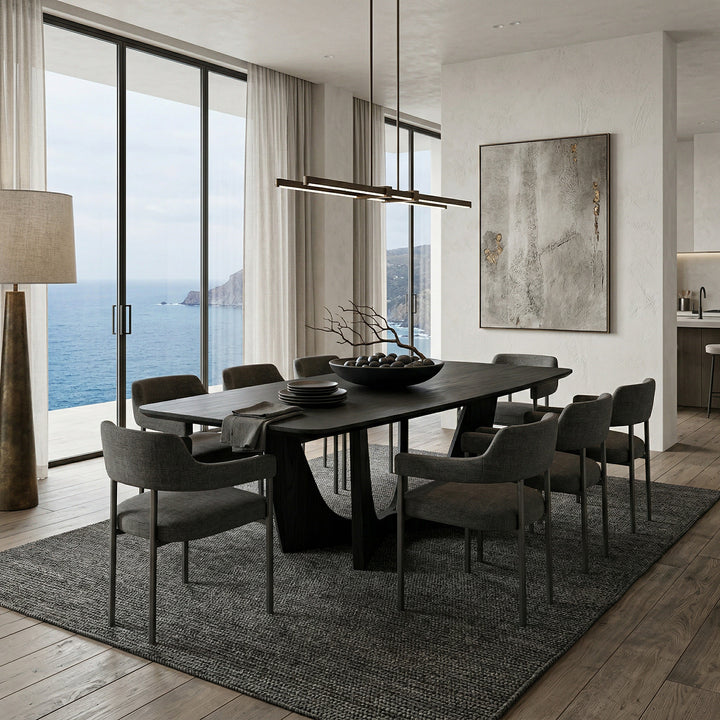 Black oak grain Vogue dining table, 2.4m long, set in a modern dining room with chairs and stylish decor.