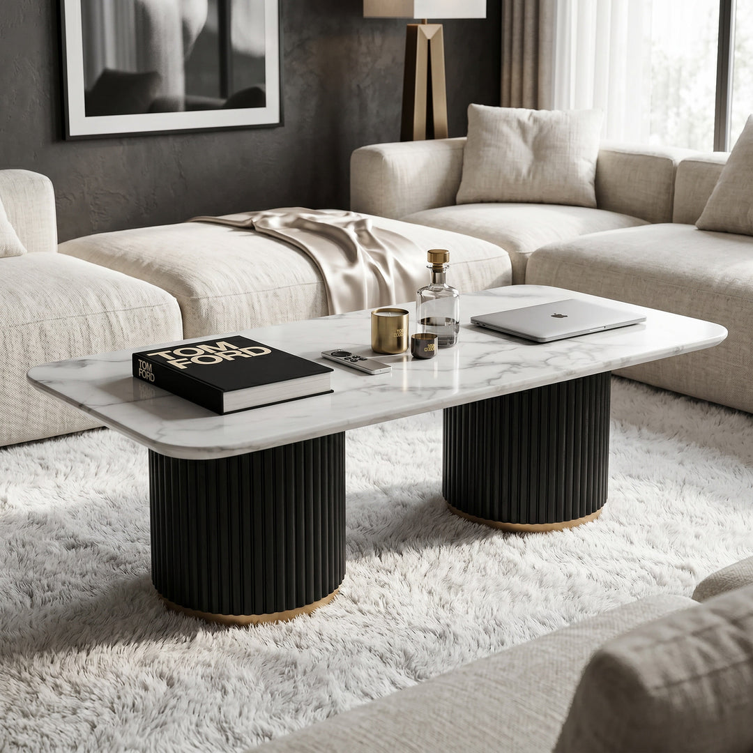 Black wood Mariella coffee table with fluted legs and brushed gold accents, modern design and sleek finish.