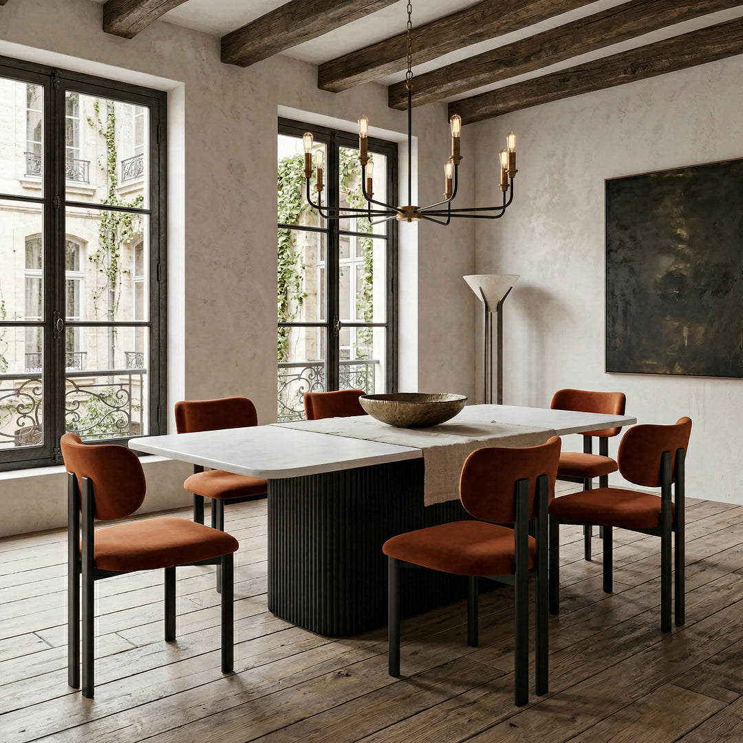 Farinelli Toffee dining chair with upholstered seat and wooden legs, shown next to a marble rectangular dining table.