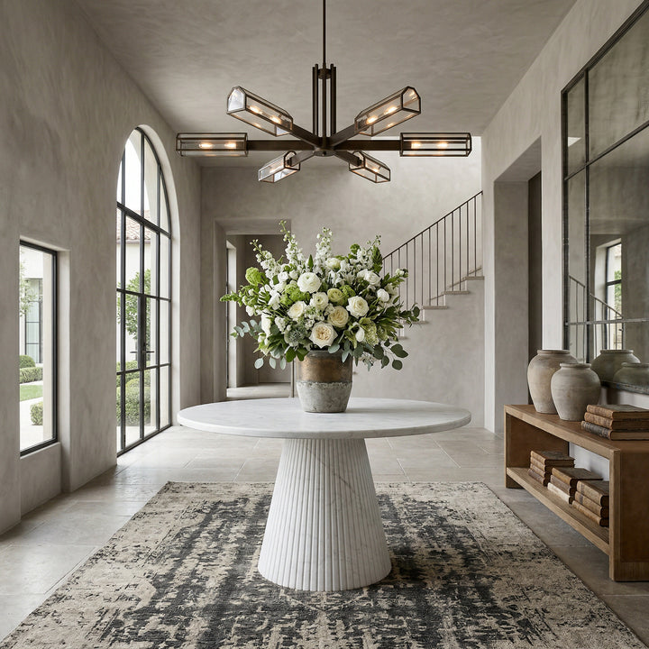 Round Verona dining table with a marble finish, 1.8 meters in length, featuring a sleek and modern design for dining rooms.