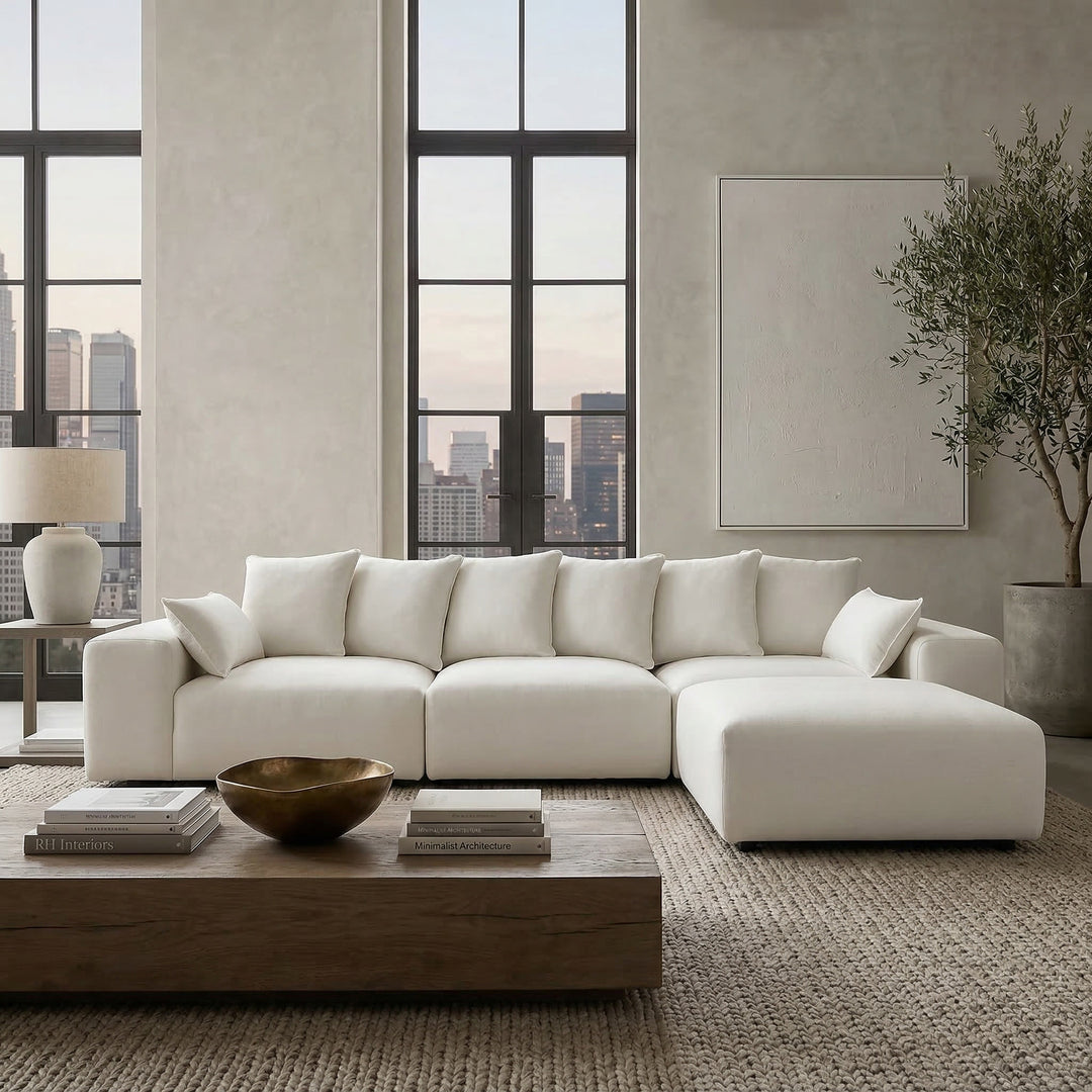 Beige CloudPuff Modular Sofa in a modern living room with plush cushions and sleek design, perfect for contemporary home decor.