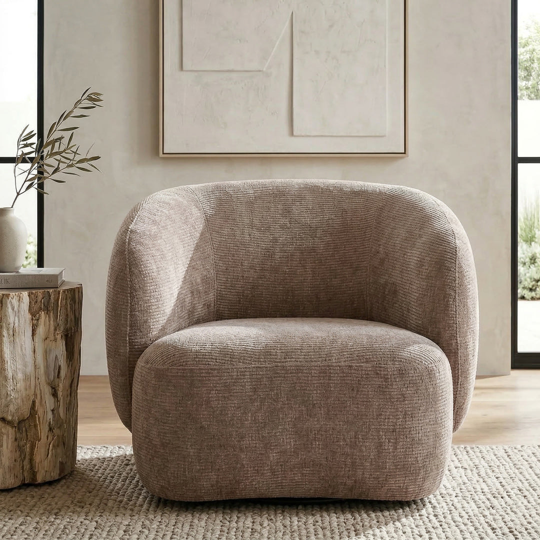 Textured mushroom-colored Puffy occasional chair with a rounded shape in a modern living room setting.