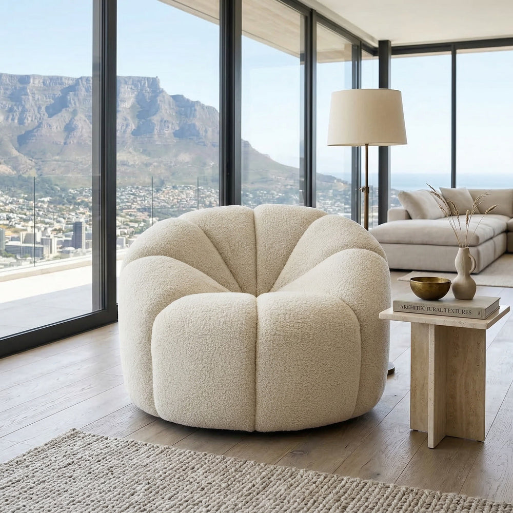 Modern Marshmellow Swivel Chair in soft pastel, featuring a rounded, plush design ideal for contemporary living room seating.