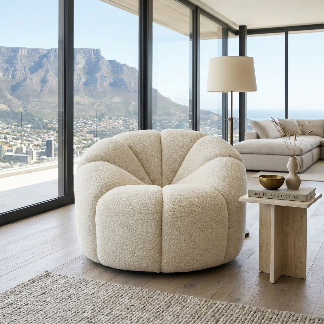 Modern Marshmellow Swivel Chair in soft pastel, featuring a rounded, plush design ideal for contemporary living room seating.