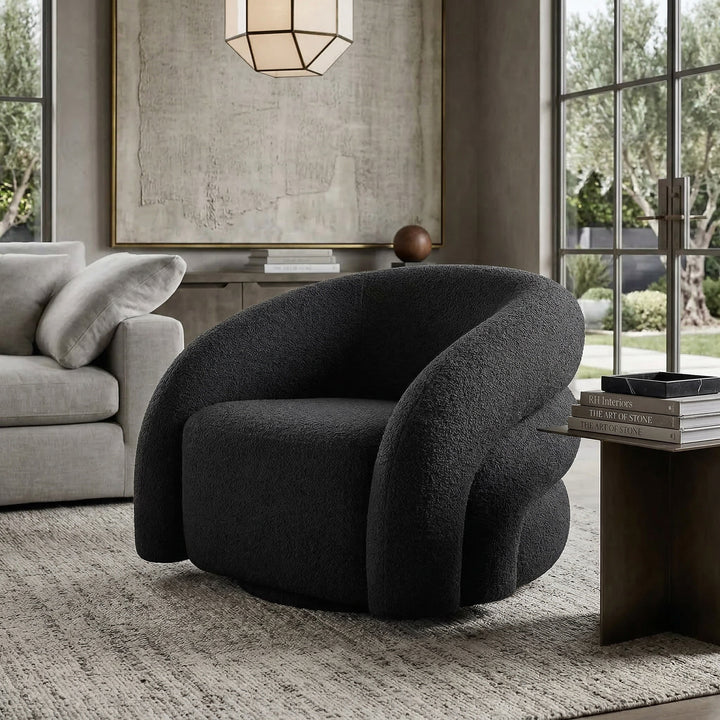 Black Ventosa Swivel Occasional Chair with a modern design, featuring a cushioned seat and swivel base in a contemporary living room setting.