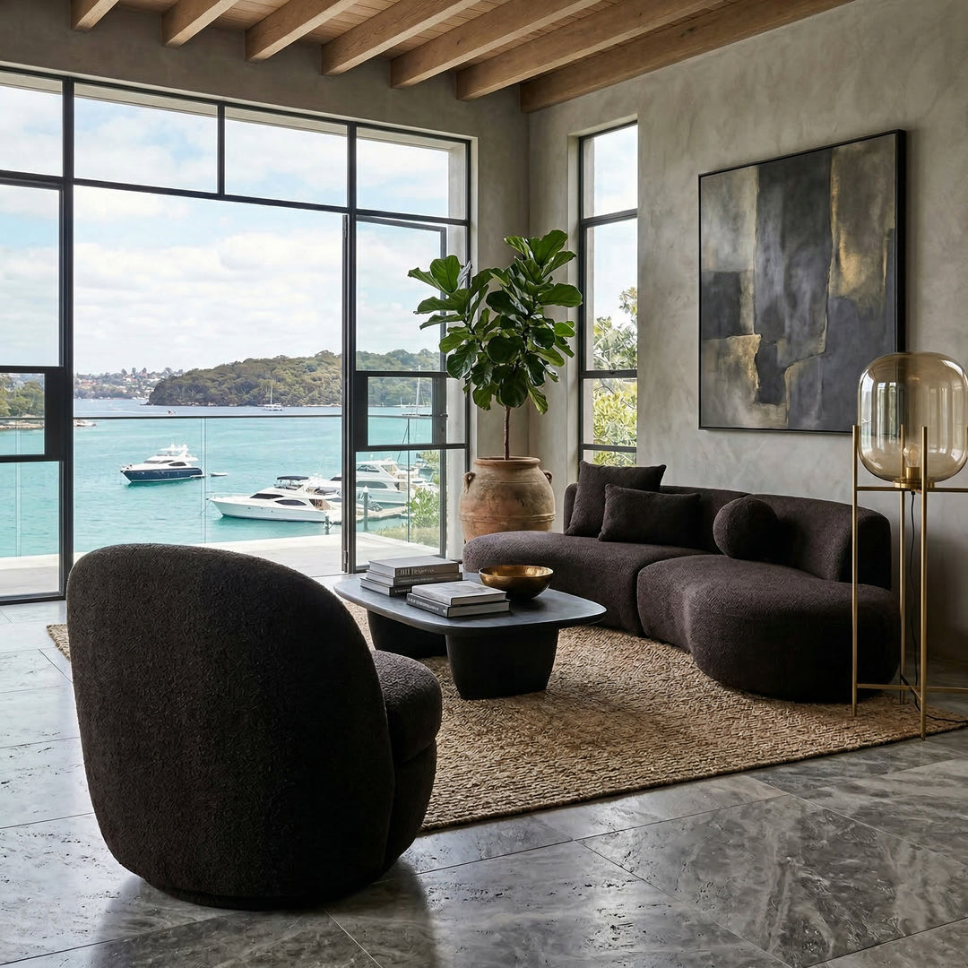 Chocolate Eleganza Curved Sofa in a modern living room with plush cushions and sleek design, showcasing a contemporary sofa style.