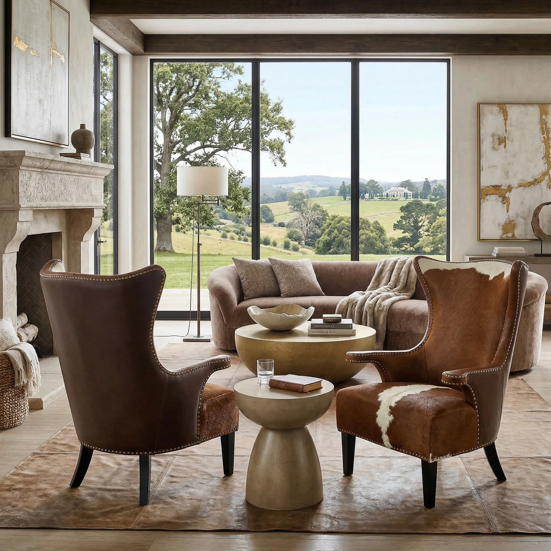 Brown cowhide Taurus occasional chair with a curved back and sleek design, perfect for stylish living room seating.