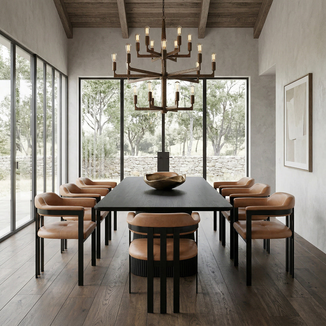Giuseppe tan leather dining chair with a sleek design, shown next to a black oak rectangular dining table.