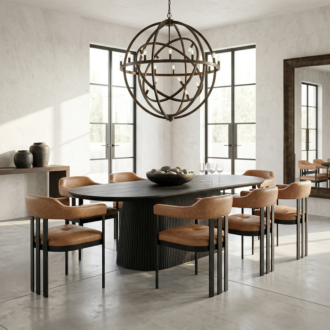 Borelli oval dining table in black oak with matching chairs, 2.4 meters long, showcasing a modern dining room setup.