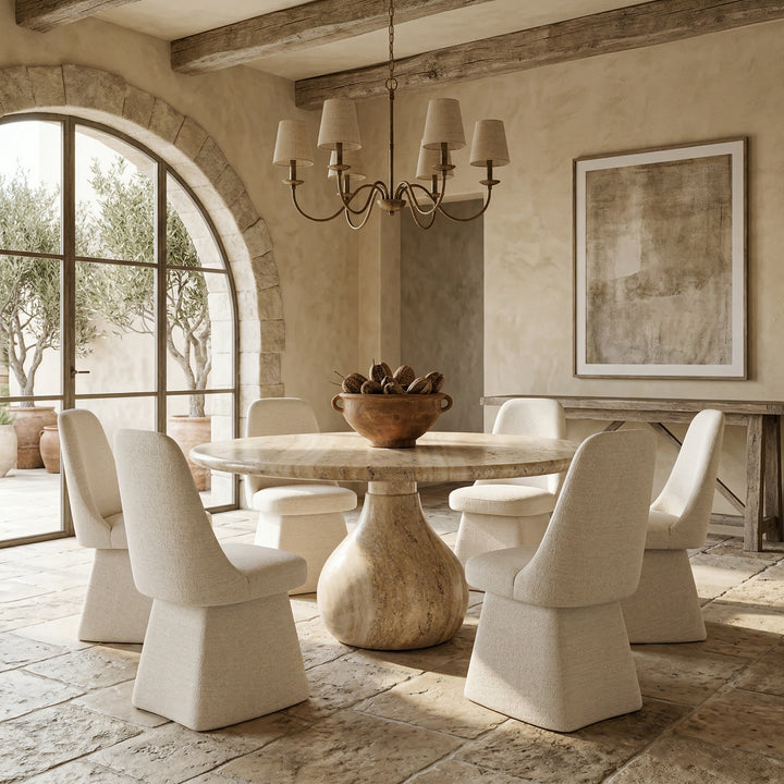 Round Aqua Dining Table with travertine finish, 1.5m diameter, paired with modern dining chairs, ideal for contemporary dining spaces.
