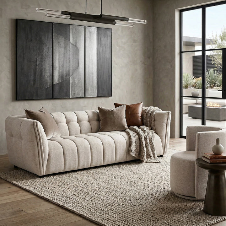 Beige Avoca 3-seater sofa with plush cushions and modern design, featuring clean lines and comfortable fabric upholstery.