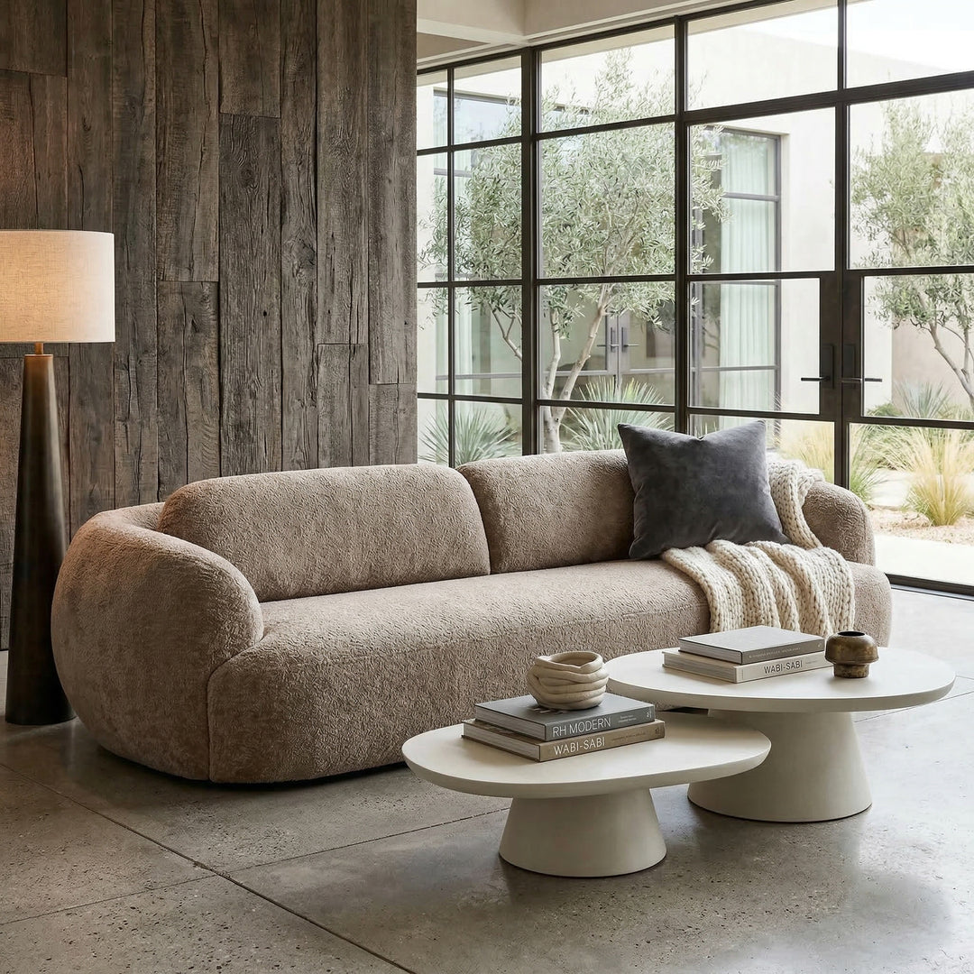 Modern Buffo sofa in a stylish living room with neutral tones and contemporary decor, showcasing its sleek design and comfortable seating.