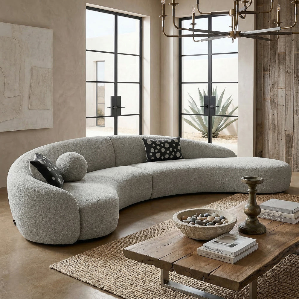 Grey boucle Mars sofa with plush cushions and modern design, showcased in a cozy living room setting.