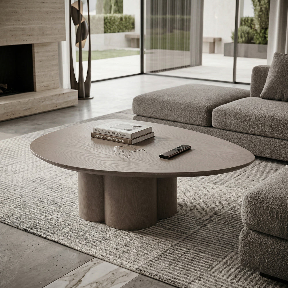 Large Quattro coffee table in a modern living room setting with a sleek, minimalist design and neutral-colored surfaces.