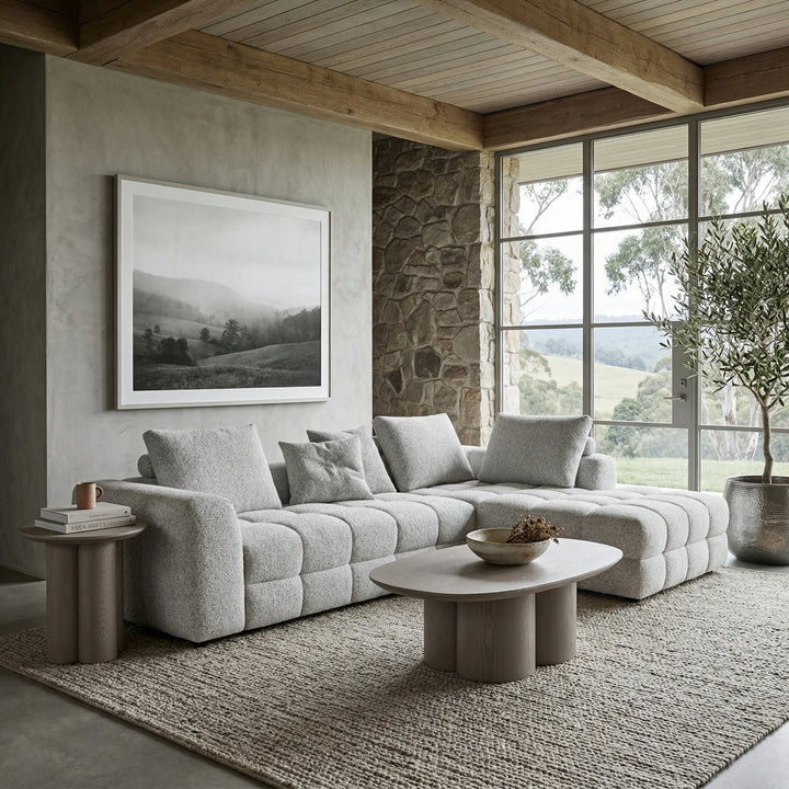 Cuddly Modular Sofa RHF in fabric, showing a close-up of the brown and beige sectional with plush cushions and modern design.
