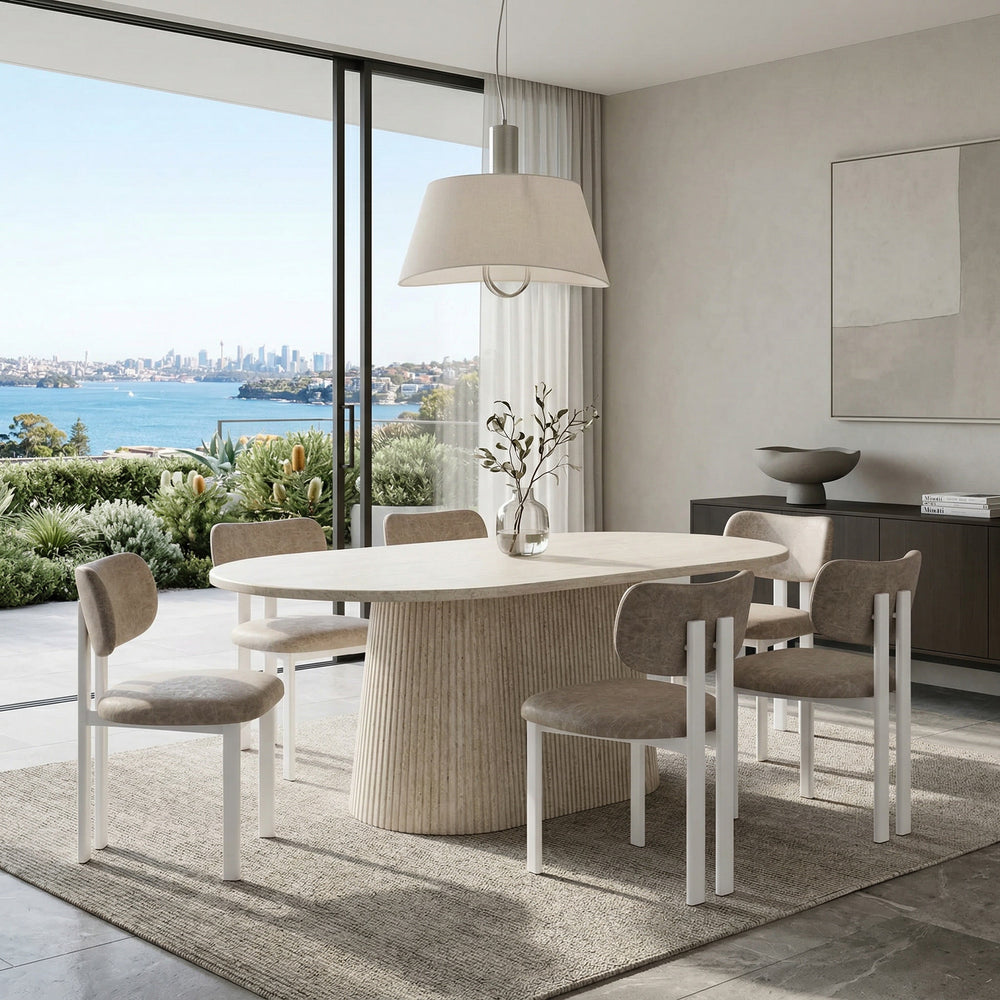 Venice Oval Dining Table in travertine finish, 1.8m, showcasing its elegant oval shape and textured surface for stylish dining spaces.