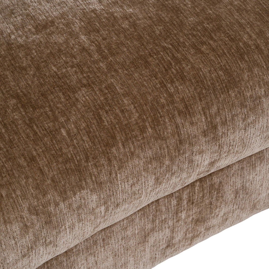 Curved Chiara sofa with plush upholstery and sleek design, featuring curved armrests and modern style for living room decor.