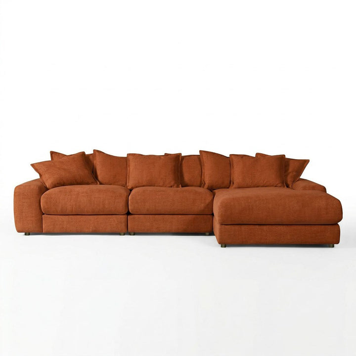 Rust-colored Snuggy Corner Sofa RHF, a cozy fabric sofa with plush cushions and modern design for stylish living room seating.